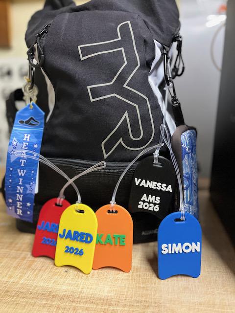 Swim Bag Tag - Kickboard.  Customizable up to 3 words. Multiple color options. Volume pricing discounts available. Great Swim Team Gift!