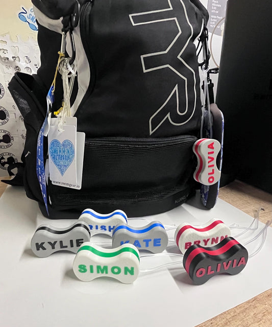 Swim Bag Tag - Pull Buoy.  Customizable. Multiple color options. Volume pricing discounts available. Great Swim Team Gift!