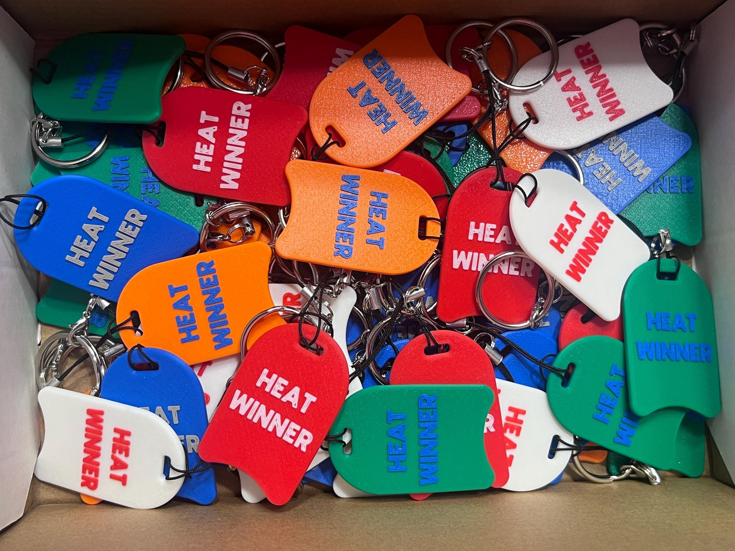 Swim Heat Winner Award - replace outdated award ribbons. Increments of 50. Swim bag keychain bag tag