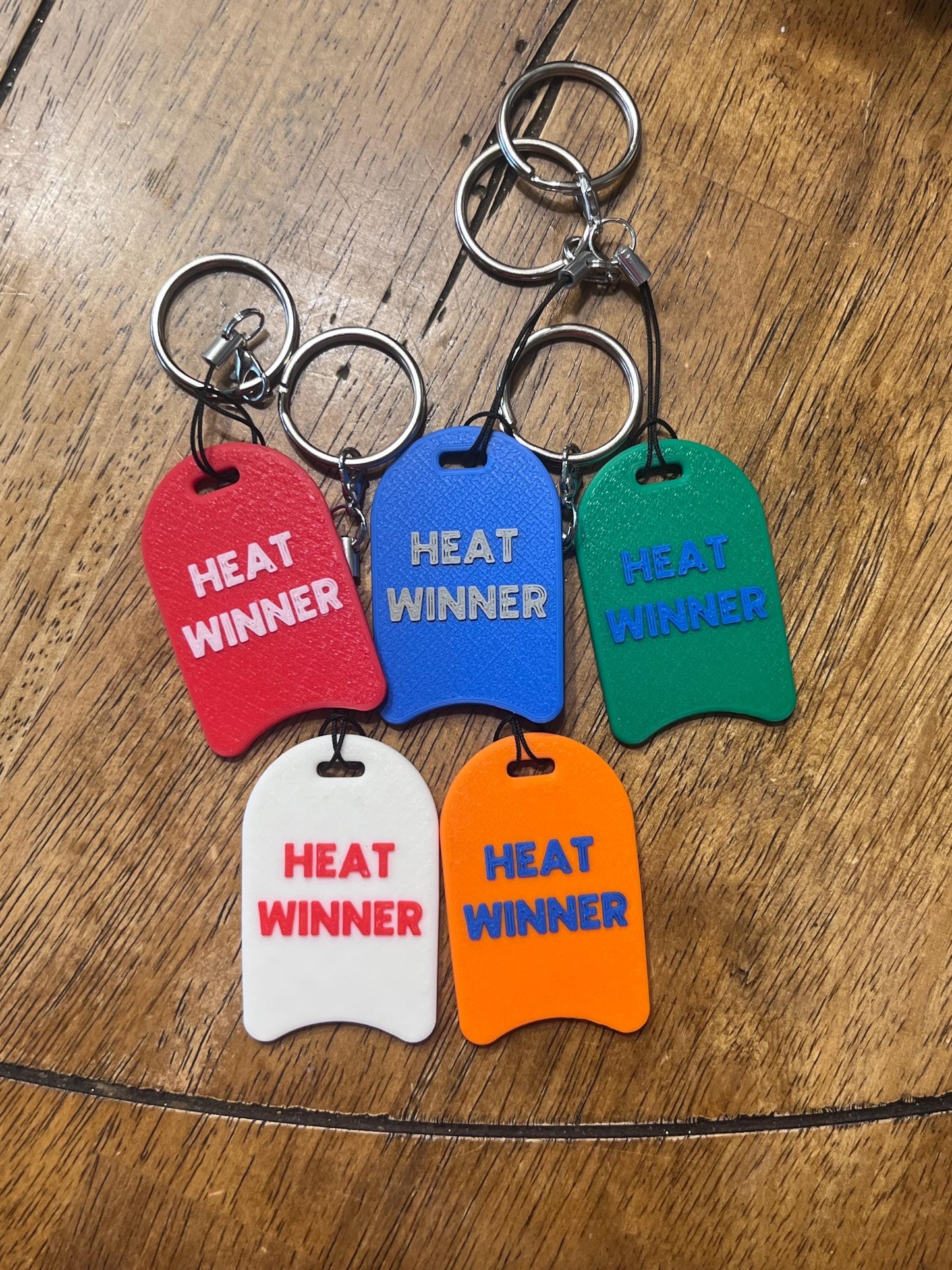 Swim Heat Winner Award - replace outdated award ribbons. Increments of 50. Swim bag keychain bag tag